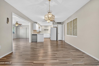 Beautifully updated 3-bedroom, 2-bath home in the heart of Sun on PalmBrook Country Club in Arizona - for sale on GolfHomes.com, golf home, golf lot