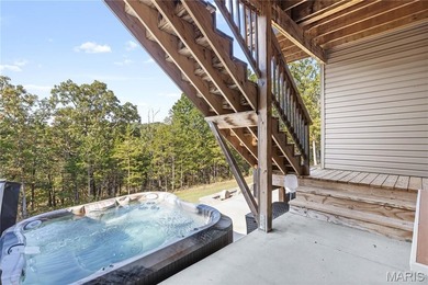 This must-see 3-bedroom, 2-full bath residence is situated on on Raintree Country Club in Missouri - for sale on GolfHomes.com, golf home, golf lot