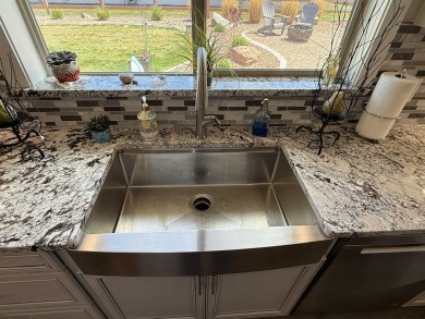 Welcome to 1210 Fairway Drive, an exceptional residence in on Adobe Creek National Golf Course in Colorado - for sale on GolfHomes.com, golf home, golf lot