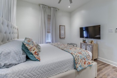 Step into coastal charm with this beautifully updated 2-bedroom on The Bridges Golf Club At Hollywood Casino in Mississippi - for sale on GolfHomes.com, golf home, golf lot
