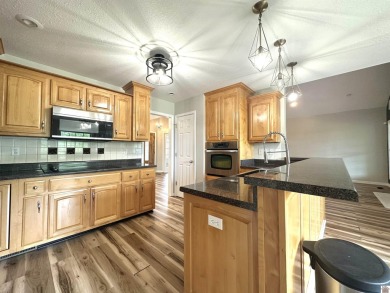 This beautifully decorated, single-level home is located above on Arrowhead Golf Club in Kentucky - for sale on GolfHomes.com, golf home, golf lot