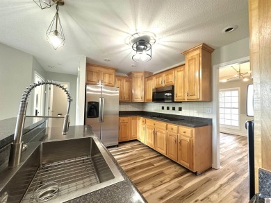 This beautifully decorated, single-level home is located above on Arrowhead Golf Club in Kentucky - for sale on GolfHomes.com, golf home, golf lot