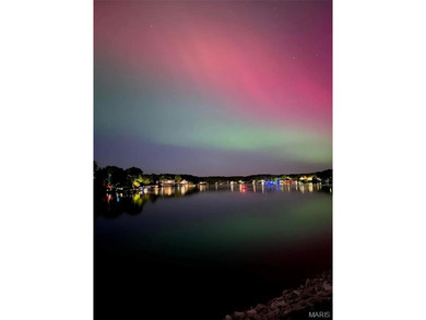 This must-see 3-bedroom, 2-full bath residence is situated on on Raintree Country Club in Missouri - for sale on GolfHomes.com, golf home, golf lot