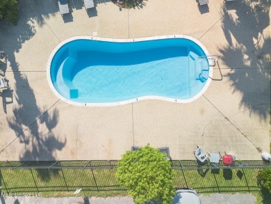 Step into coastal charm with this beautifully updated 2-bedroom on The Bridges Golf Club At Hollywood Casino in Mississippi - for sale on GolfHomes.com, golf home, golf lot
