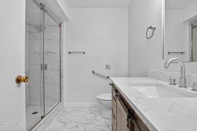 Beautifully updated 3-bedroom, 2-bath home in the heart of Sun on PalmBrook Country Club in Arizona - for sale on GolfHomes.com, golf home, golf lot