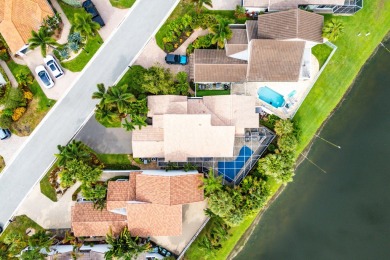 Stunning 3BR/2.5BA lakefront pool home in Newport Bay Club! This on St. Andrews Country Club of Boca Raton in Florida - for sale on GolfHomes.com, golf home, golf lot