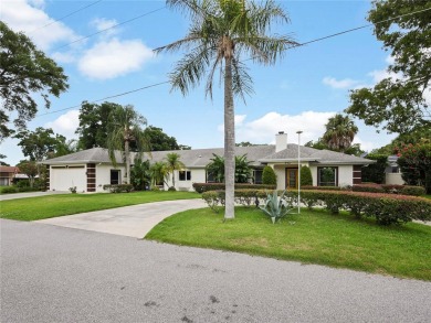 This amazing, meticulously remodeled one-story pool home offers on Rolling Hills Golf Club in Florida - for sale on GolfHomes.com, golf home, golf lot