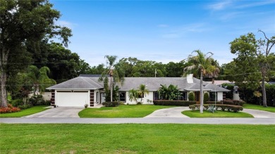 This amazing, meticulously remodeled one-story pool home offers on Rolling Hills Golf Club in Florida - for sale on GolfHomes.com, golf home, golf lot