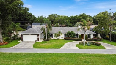 This amazing, meticulously remodeled one-story pool home offers on Rolling Hills Golf Club in Florida - for sale on GolfHomes.com, golf home, golf lot
