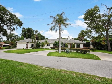 This amazing, meticulously remodeled one-story pool home offers on Rolling Hills Golf Club in Florida - for sale on GolfHomes.com, golf home, golf lot