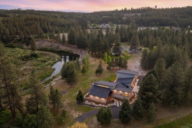 Tucked on nearly 6 private acres within Spokane city limits on The Creek at Qualchan in Washington - for sale on GolfHomes.com, golf home, golf lot