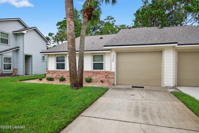 Warm and Inviting 2 bedroom 2 bath patio-style condo in a on The Club At Pelican Bay - South Course in Florida - for sale on GolfHomes.com, golf home, golf lot