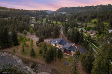 Tucked on nearly 6 private acres within Spokane city limits on The Creek at Qualchan in Washington - for sale on GolfHomes.com, golf home, golf lot