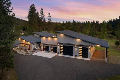Tucked on nearly 6 private acres within Spokane city limits on The Creek at Qualchan in Washington - for sale on GolfHomes.com, golf home, golf lot