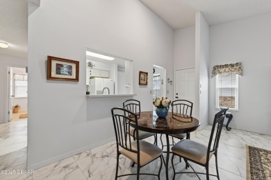 Warm and Inviting 2 bedroom 2 bath patio-style condo in a on The Club At Pelican Bay - South Course in Florida - for sale on GolfHomes.com, golf home, golf lot