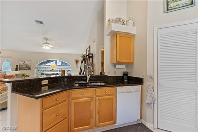 Welcome to this 3-bedroom, 2.5-bathroom pool home on Pine Island on Alden Pines Golf Club in Florida - for sale on GolfHomes.com, golf home, golf lot