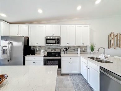 Beautifully decorated and meticulously maintained, this fully on Lakewood National Golf Club in Florida - for sale on GolfHomes.com, golf home, golf lot