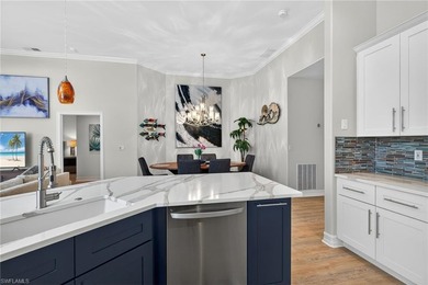 Sensational and fully renovated, this second-floor carriage home on Pelican Sound Golf and River Club in Florida - for sale on GolfHomes.com, golf home, golf lot