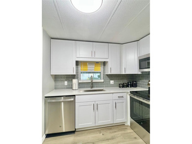 Look no further--this exceptional, completely renovated home on Fairway Village Golf Course in Florida - for sale on GolfHomes.com, golf home, golf lot