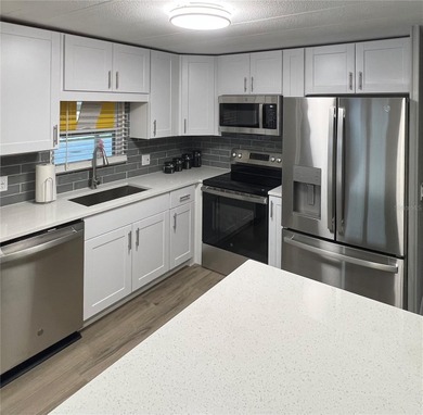 Look no further--this exceptional, completely renovated home on Fairway Village Golf Course in Florida - for sale on GolfHomes.com, golf home, golf lot