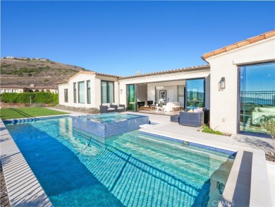 Completed in March 2021, this ONE-LEVEL Santa Barbara-inspired on Trump National Golf Course in California - for sale on GolfHomes.com, golf home, golf lot