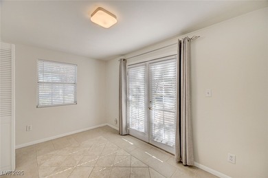 Rarely Available One-Story End-Unit Brick Townhome adjacent to on Las Vegas Country Club in Nevada - for sale on GolfHomes.com, golf home, golf lot