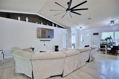 Welcome to this beautifully renovated 4 bedroom, 2 bathroom home on Sun n Lake Golf and Country Club in Florida - for sale on GolfHomes.com, golf home, golf lot