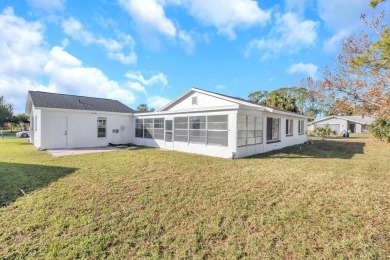 Incredible 3-bedroom/2-bathroom home with a large, attached on Palm Harbor Golf Club in Florida - for sale on GolfHomes.com, golf home, golf lot