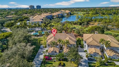 Sensational and fully renovated, this second-floor carriage home on Pelican Sound Golf and River Club in Florida - for sale on GolfHomes.com, golf home, golf lot