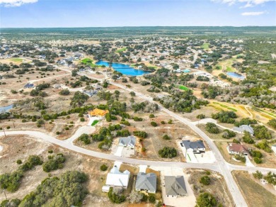 Prepare to be amazed by this stunning home built by ACH Homes on Vaaler Creek Golf Club in Texas - for sale on GolfHomes.com, golf home, golf lot