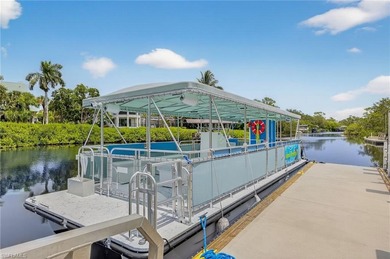 Sensational and fully renovated, this second-floor carriage home on Pelican Sound Golf and River Club in Florida - for sale on GolfHomes.com, golf home, golf lot