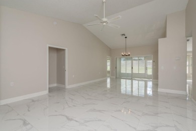 GORGEOUS REMODELED VILLA in TIMBER GREENS a vibrant 55+ golf on Timber Greens Country Club in Florida - for sale on GolfHomes.com, golf home, golf lot