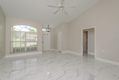 GORGEOUS REMODELED VILLA in TIMBER GREENS a vibrant 55+ golf on Timber Greens Country Club in Florida - for sale on GolfHomes.com, golf home, golf lot