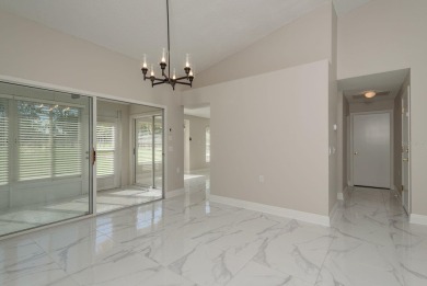 GORGEOUS REMODELED VILLA in TIMBER GREENS a vibrant 55+ golf on Timber Greens Country Club in Florida - for sale on GolfHomes.com, golf home, golf lot