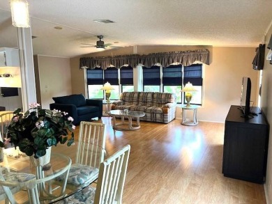 This stunning 2-bedroom, 2-bath, 1,456 sq. ft. home is perfectly on Crystal Lake Club in Florida - for sale on GolfHomes.com, golf home, golf lot