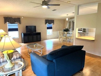 This stunning 2-bedroom, 2-bath, 1,456 sq. ft. home is perfectly on Crystal Lake Club in Florida - for sale on GolfHomes.com, golf home, golf lot