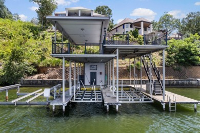 Nestled among the serene shores of Wilson Lake this magnificent on The Shoals Golf Club in Alabama - for sale on GolfHomes.com, golf home, golf lot