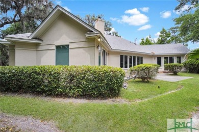 Large garage with full bonus above garage and full bath. Brick on The Landings Club - Palmetto in Georgia - for sale on GolfHomes.com, golf home, golf lot