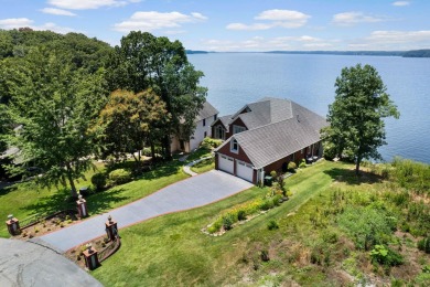 Nestled among the serene shores of Wilson Lake this magnificent on The Shoals Golf Club in Alabama - for sale on GolfHomes.com, golf home, golf lot