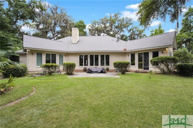 Large garage with full bonus above garage and full bath. Brick on The Landings Club - Palmetto in Georgia - for sale on GolfHomes.com, golf home, golf lot