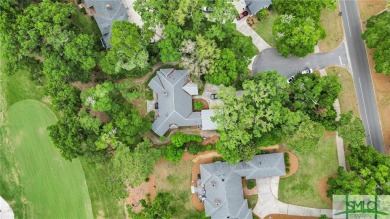 Large garage with full bonus above garage and full bath. Brick on The Landings Club - Palmetto in Georgia - for sale on GolfHomes.com, golf home, golf lot