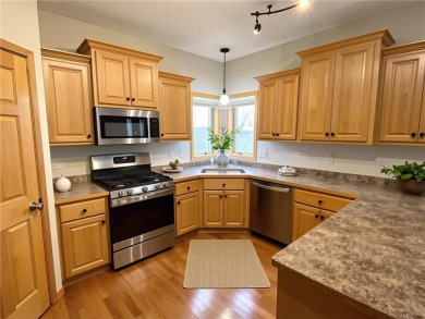 Wake up to shimmering pond views and end your day with golden on The Ponds Golf Club in Minnesota - for sale on GolfHomes.com, golf home, golf lot