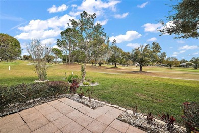 OUTSTANDING GOLF FRONT CUSTOM GRANVILLE IN WINDWARD HILLS WITH on Eagle Ridge At Spruce Creek Country Club in Florida - for sale on GolfHomes.com, golf home, golf lot
