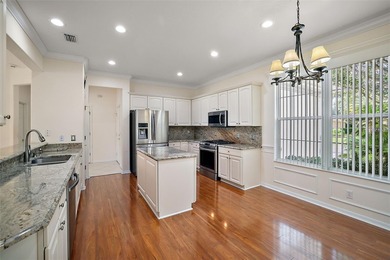 OUTSTANDING GOLF FRONT CUSTOM GRANVILLE IN WINDWARD HILLS WITH on Eagle Ridge At Spruce Creek Country Club in Florida - for sale on GolfHomes.com, golf home, golf lot