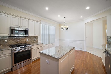 OUTSTANDING GOLF FRONT CUSTOM GRANVILLE IN WINDWARD HILLS WITH on Eagle Ridge At Spruce Creek Country Club in Florida - for sale on GolfHomes.com, golf home, golf lot