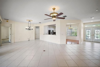 OUTSTANDING GOLF FRONT CUSTOM GRANVILLE IN WINDWARD HILLS WITH on Eagle Ridge At Spruce Creek Country Club in Florida - for sale on GolfHomes.com, golf home, golf lot