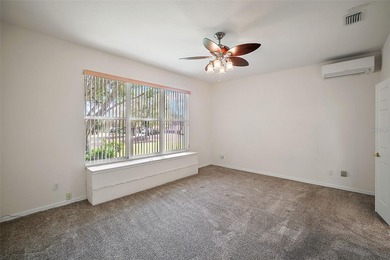 OUTSTANDING GOLF FRONT CUSTOM GRANVILLE IN WINDWARD HILLS WITH on Eagle Ridge At Spruce Creek Country Club in Florida - for sale on GolfHomes.com, golf home, golf lot