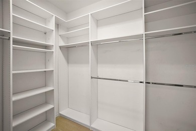 OUTSTANDING GOLF FRONT CUSTOM GRANVILLE IN WINDWARD HILLS WITH on Eagle Ridge At Spruce Creek Country Club in Florida - for sale on GolfHomes.com, golf home, golf lot