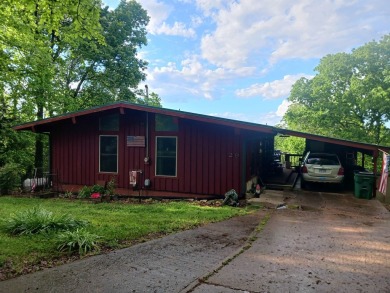 Spectacular view!! This 2/2 home on 2+ acres sits on a bluff on Cherokee Village North Course in Arkansas - for sale on GolfHomes.com, golf home, golf lot
