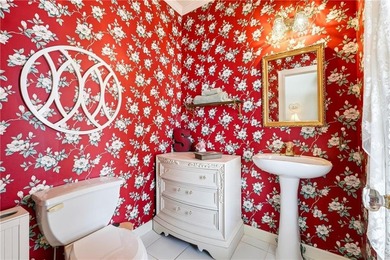 Welcome home to this charming Southern Living style home tucked on The Providence Club in Georgia - for sale on GolfHomes.com, golf home, golf lot